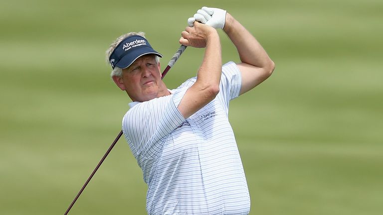 Colin Montgomerie of Scotland hits his second shot on the 5th hole during the final round of the Senior PGA Championship