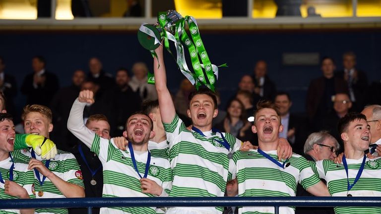 Celtic captain Connor McManus celebrates with the Scottish Youth Cup