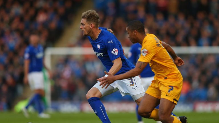 CHESTERFIELD, ENGLAND - MAY 07:  Daniel Jones of Chesterfield takes on Chris Humphrey of Preston North End during the Sky Bet League One Playoff Semi-Final