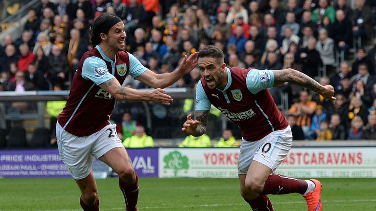 Danny Ings celebrates scoring his goal with George Boyd during the English Premier League football match between Hull City and Burnley