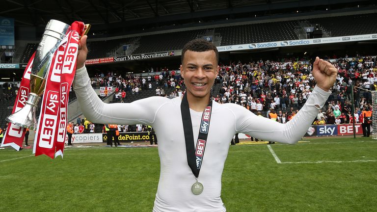 MILTON KEYNES, ENGLAND - MAY 03:  Dele Alli of MK Dons celebrates after gaining promotion to the Championship at the end of the Sky Bet League One match be