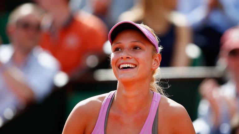 Donna Vekic of Croatia smiles during her Women's Singles match against Caroline Garcia of France on day one of the 2015 French OpeN