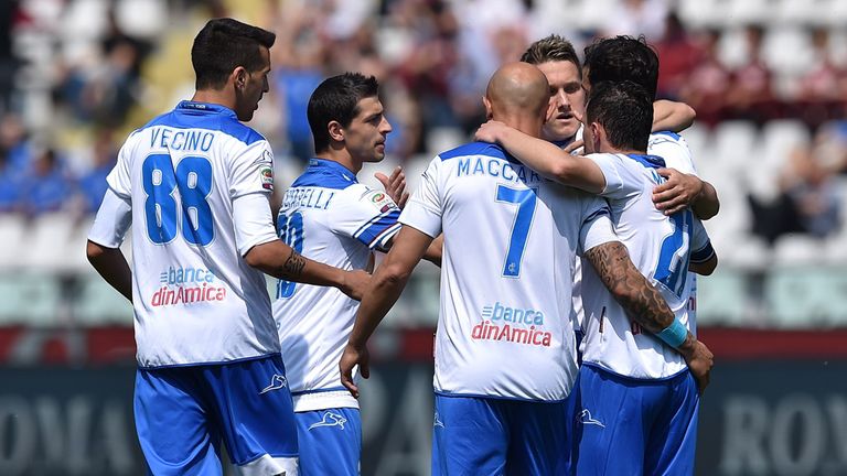 Empoli players celebrate after Daniele Padelli's own goal