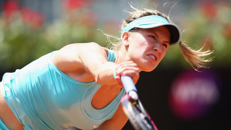 ROME, ITALY - MAY 14:  Eugenie Bouchard of Canada in action during her match against Carla SuÃ¡rez Navarro of Spain on Day Five of the The Internazionali