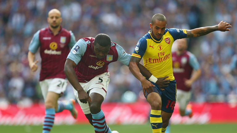 Jores Okore tangled with Walcott in the early stages