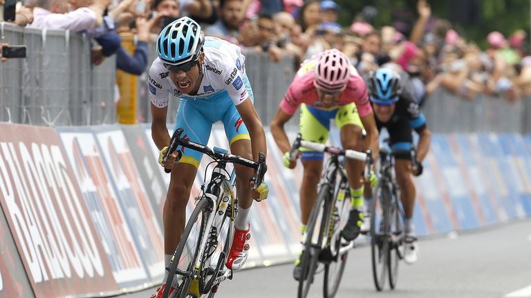 Fabio Aru (Astana), Alberto Contador (Tinkoff Saxo) and Australian Richie Porte (team Sky) cross the finish line of the 9th stage of the 98th Giro d'Italia
