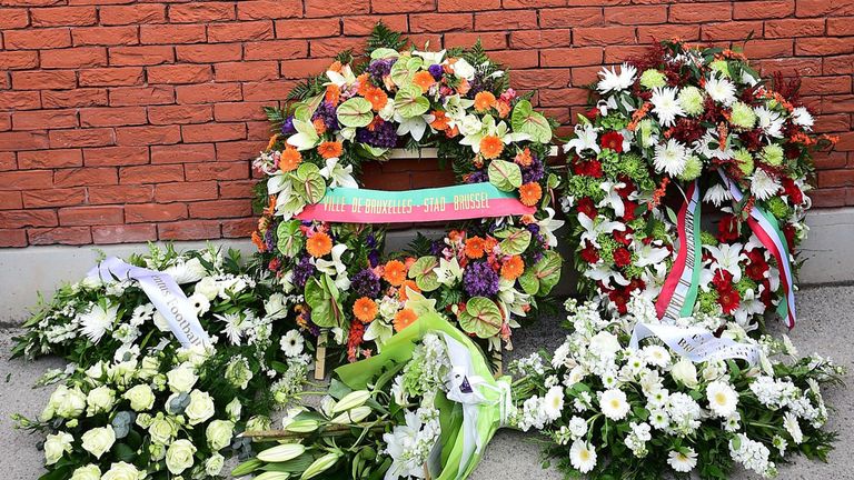 Floral tributes at the foot of the Heysel memorial plaque at Anfield