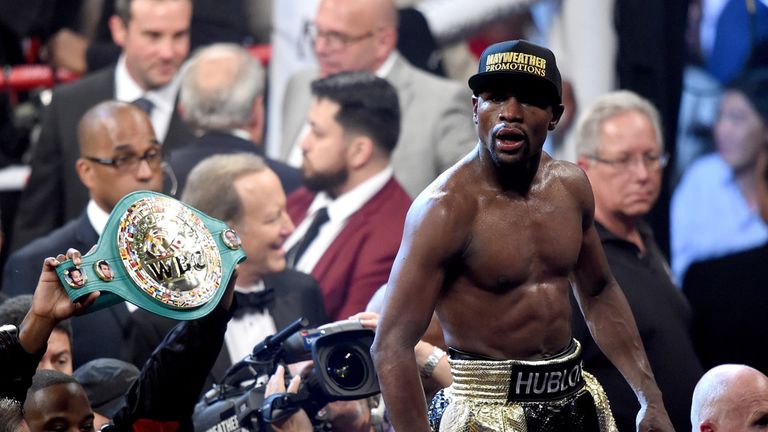 Floyd Mayweather Jr. celebrates the unanimous decision victory over Manny Pacquiao