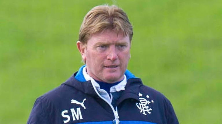 Rangers manager Stuart McCall watches over training