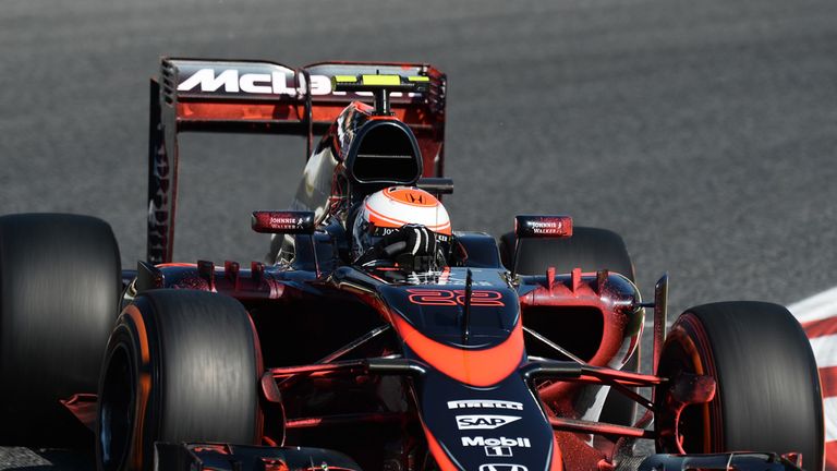 Jenson Button in the new look McLaren, covered in flow-vis paint
