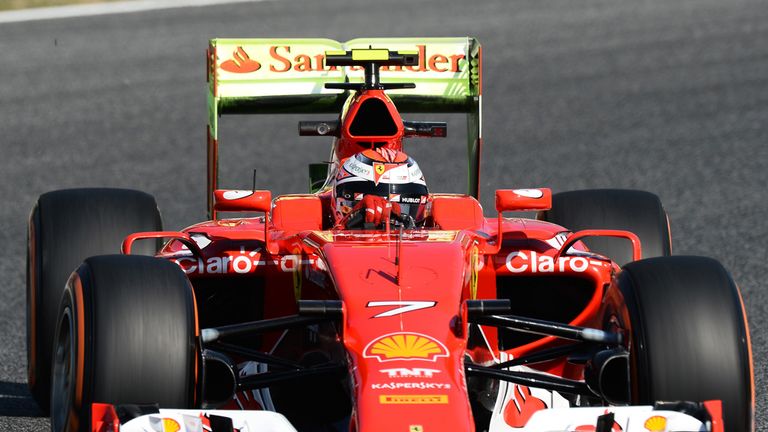 Kimi Raikkonen with aero paint on rear wing 