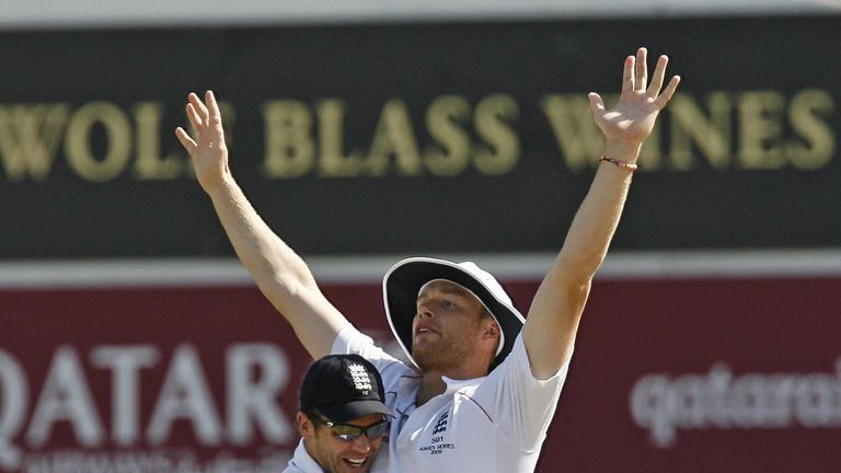 England's Andrew Flintoff celebrates running out Australia's Captain Ricky Ponting (not pictured) with England's James Anderson(L) during the Australian 2n