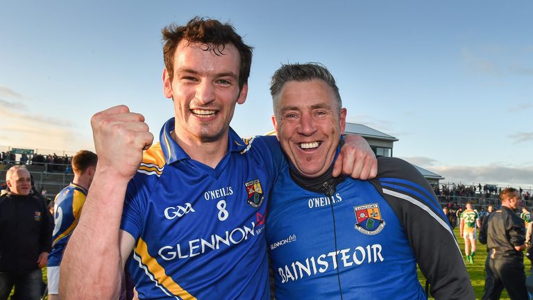 Longford midfielder Barry Gilleran celebrates with his manager Jack Sheedy after the final whistle