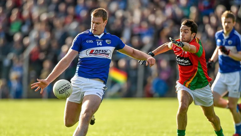 Donal Kingston Laois in action against Benny Kavanagh Carlow