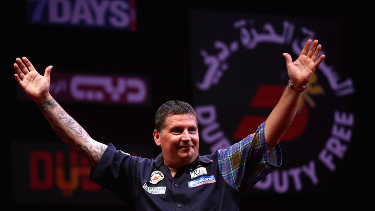 Gary Anderson of Scotland celebrates after winning against James Wade of England during the 2015 Dubai Duty Free Darts