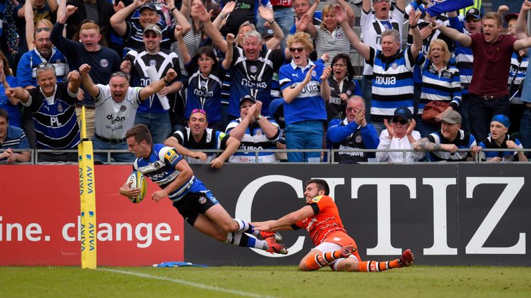 BATH, ENGLAND - MAY 23:  Bath player George Ford goes over to score despite the tackle of Tommy Bell of the Tigers during the Aviva Premiership semi final 