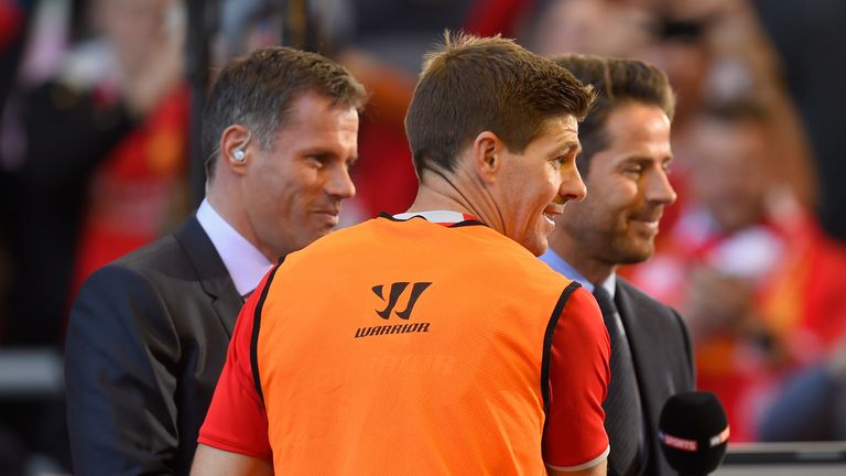 Gerrard talks to former Liverpool players Jamie Carragher and Jamie Reknapp before the match.