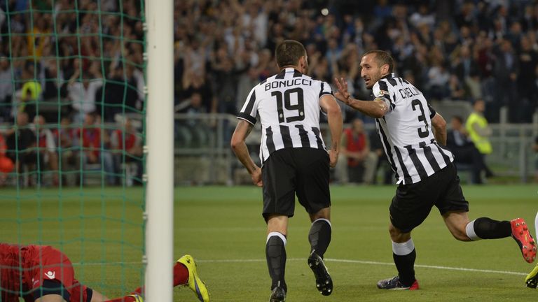 Giorgio Chiellini wheels away in celebration after his equaliser for Juventus