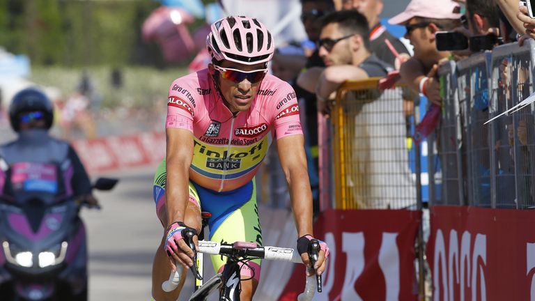 Spanish rider Alberto Contador crosses the finish line in Verbania on May 28, 2015 at the end of the 18th stage of the 98th Giro d'Italia