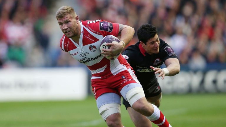 Gloucester's Ross Moriarty is tackled by Edinburgh's Phil Burleigh
