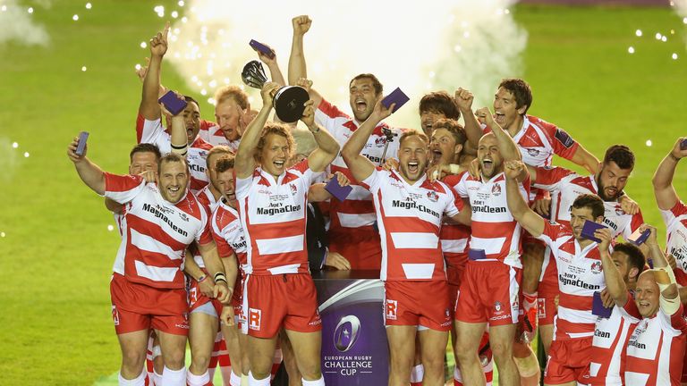 LONDON, ENGLAND - MAY 01: Billy Twelvetrees, the Gloucester captain, raises the trophy after thier victory during the European Rugby Challenge Cup Final ma