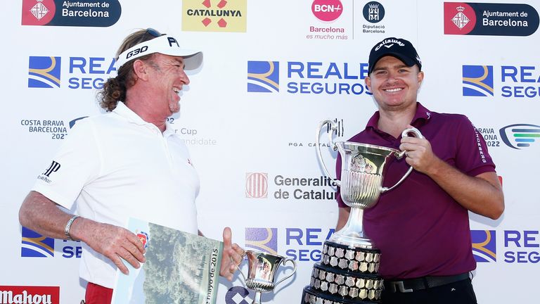 James Morrison poses with the Trophy after winning the Open de Espana along with runner up Miguel Angel Jimenez 