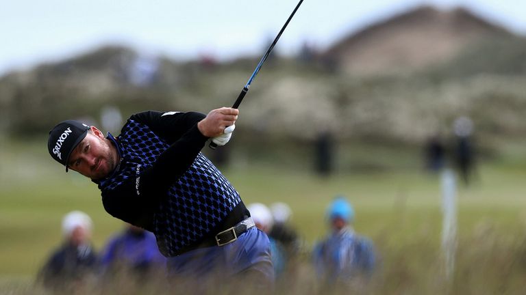 Graeme McDowell plays from the rough on the 18th during day one of the Dubai Duty Free Irish Open at Royal County Down Golf Club, Newcastle