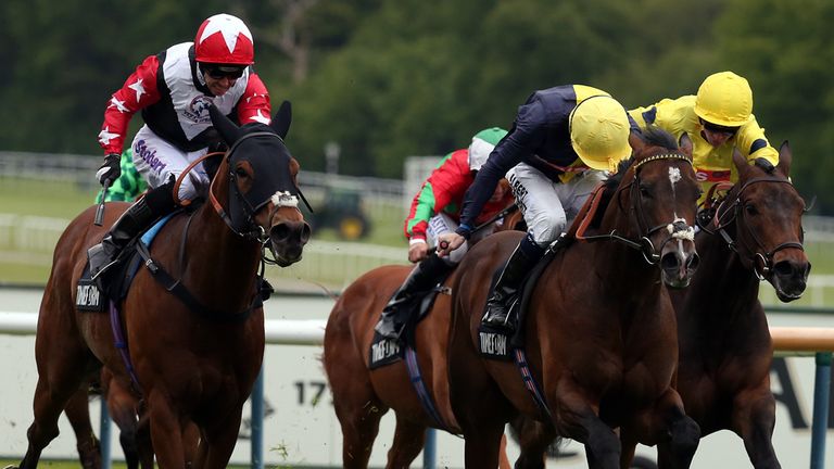 Cable Bay ridden by Jamie Spencer wins the Timeform Jury Stakes at Haydock from the fast-finishing Ascription.