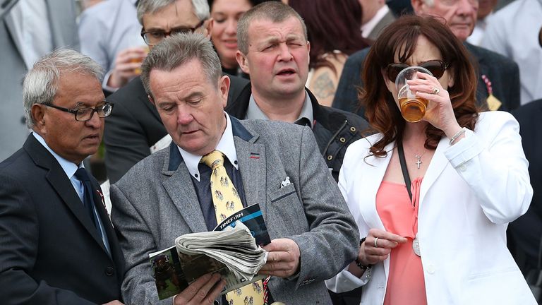 Racegoers study the form during the 888sport Achilles Stakes at Haydock