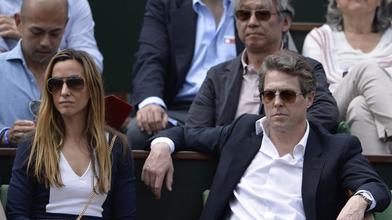 Actor Hugh Grant watched  the equally debonair Federer at Roland Garros this week