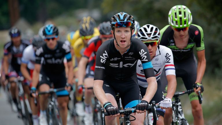 Ian Boswell of the United States riding for Team Sky sets pace at the front of the race with the yellow jersey group on the final 