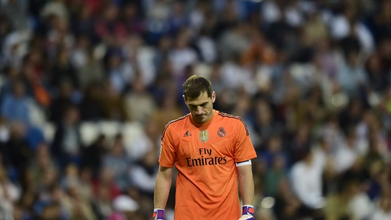 Real Madrid's goalkeeper Iker Casillas looks towrds the ground during the Spanish league football match Real Madrid CF vs Getafe CF