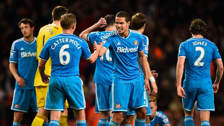 Lee Cattermole and Jack Rodwell of Sunderland celebrate securing Premier League safety  with team mates
