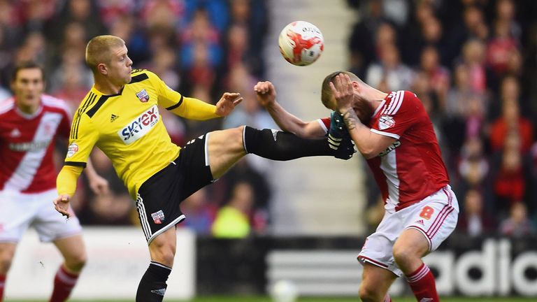 MIDDLESBROUGH, ENGLAND - MAY 15:  Jake Bidwell of Brentford challenges Adam Clayton of Middlesbrough during the Sky Bet Championship Playoff semi final sec