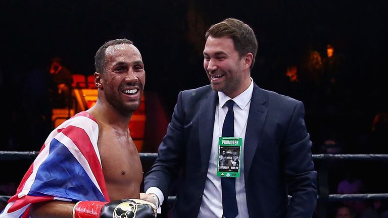 James DeGale celebrates his win over Andre Dirrell with Eddie Hearn