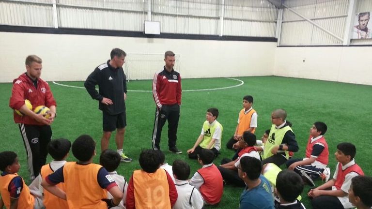 Jamie Carragher delivering a coaching session at his sports academy