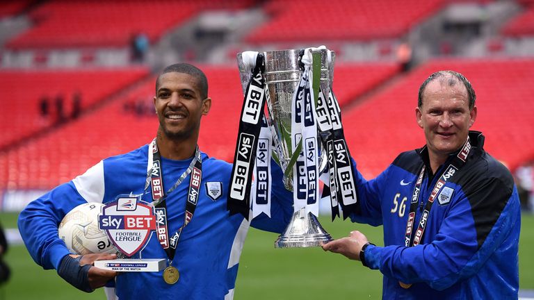 Beckford celebrated after the match with North End manager Simon Grayson 