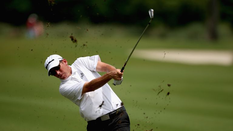 Jim Herman hits out of the bunker on the 11th hole during the final round of the Zurich Classic of New Orleans.