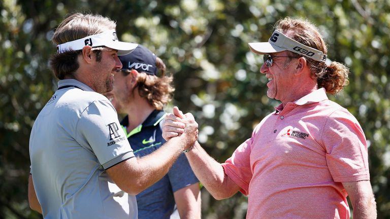 Miguel Angel Jimenez celebrates after a hole in one with Victor Dubuisson during Day 2 of the Open de Espana