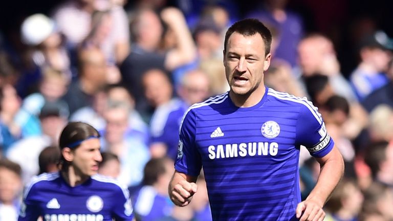 Chelsea's John Terry runs back to his post after scoring their first goal of the game