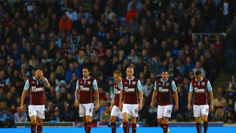 BURNLEY, ENGLAND - AUGUST 18: Danny Ings, Michael Duff, David Jones, Lukas Jutkiewicz and Dean Marney of Burnley look deejcted after conceding a third goal