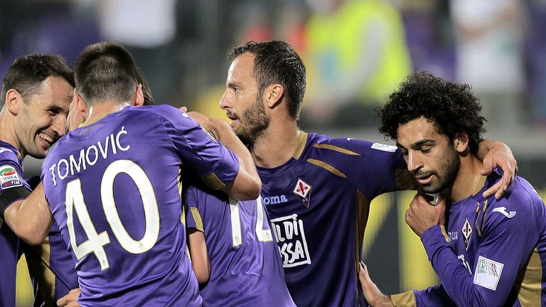 Fiorentina players celebrate a goal scored by Josip Ilicic