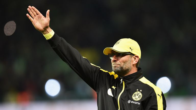 Jurgen Klopp waves farewell to Dortmund fans after the German Cup final