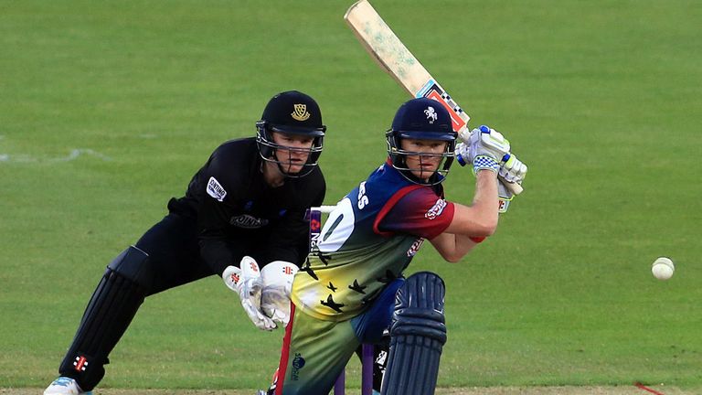 Kent's Sam Billings in action watched by Sussex's Ben Brown during the Natwest T20 Blast match at the St Lawrence Ground, Canterbury.