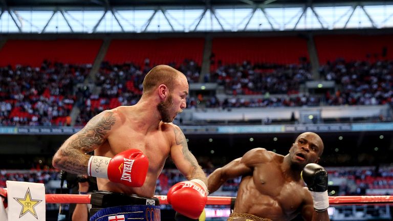 LONDON, ENGLAND - MAY 31:  Kevin Mitchell in action with Ghislain Maduma during their World Lightweight Final Eliminator bout at Wembley Stadium on May 31,