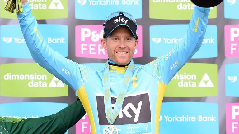 Team Sky Rider Lars-Petter NORDHAUG celebrates with the trophy after the Tour de Yorkshire. 