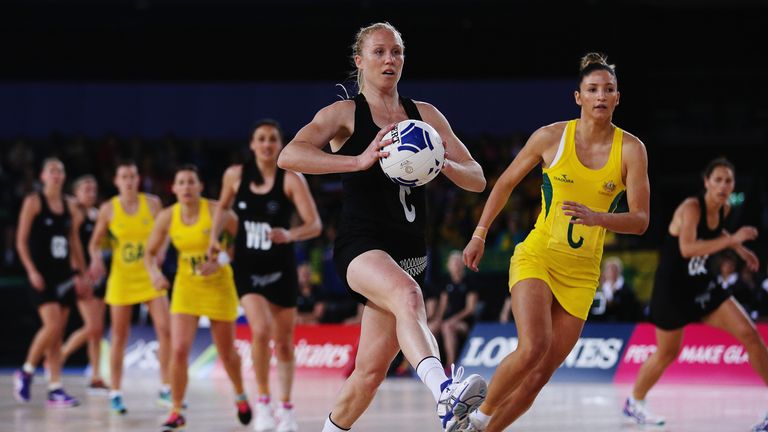 Laura Langman of New Zealand passes the ball out the gold medal match between Australia and New Zealand at SECC Precinct dur