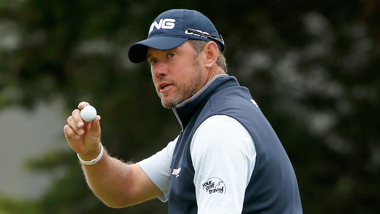  Lee Westwood of England reacts after making a putt on the 12th hole during round three of the WGC-Cadillac Match Play 