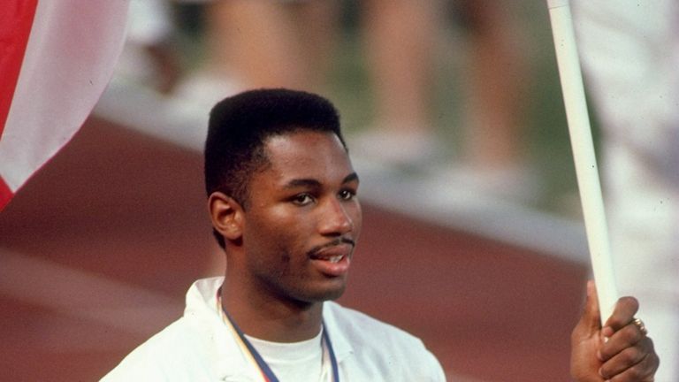 2 Oct 1988:  Heavyweight boxer Lennox Lewis of Canada carries his National flag during the closing ceremony of the 1988 Olympic Games at the Olympic Stadiu