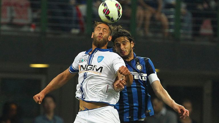 Levan Mchedlidze of Empoli competes for the ball with Inter's Andrea Ranocchia 